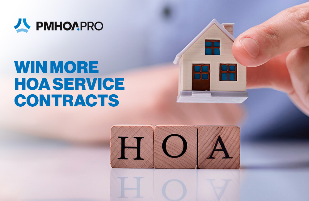 A close-up image of a hand holding a small model house above wooden blocks that spell out ‘HOA.’ On the left side, the text reads ‘WIN MORE HOA SERVICE CONTRACTS’ in bold blue letters, with the PMHOA.PRO logo above it. The background is softly blurred, focusing attention on the house and text